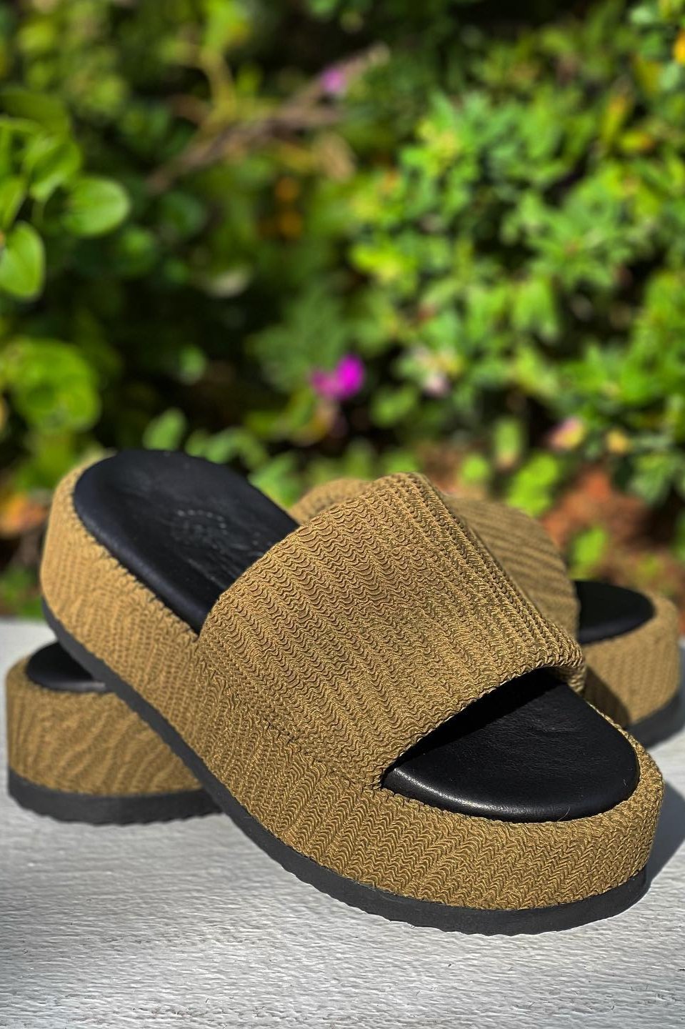 Sunny shot of khaki platform slides